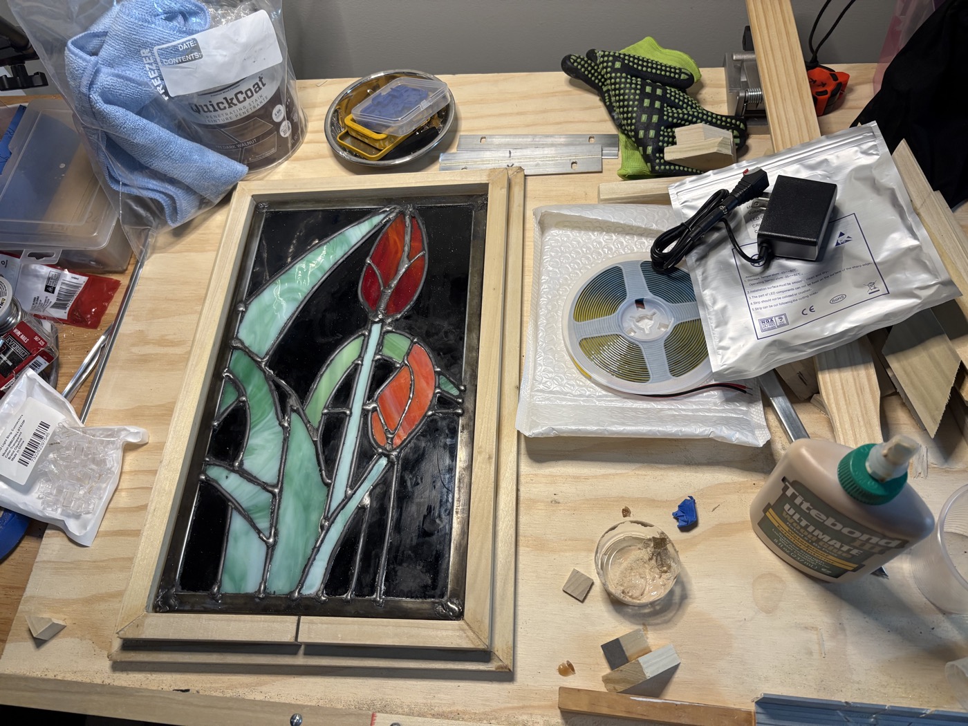 Finished tulip stained glass panel in a wooden frame with LED light box parts